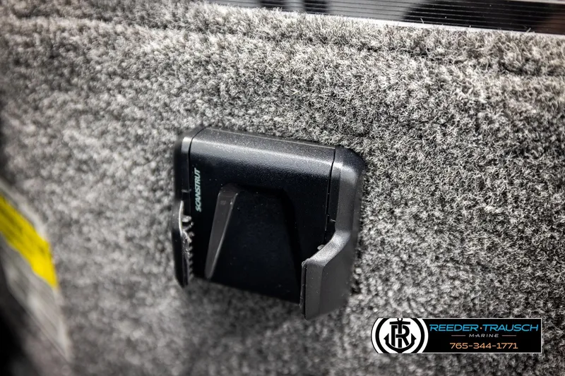 Slide: The Image of 2026 Lund 1775 Adventure SS interior detail with mounted accessory, Reeder-Trausch Marine branding. - 33