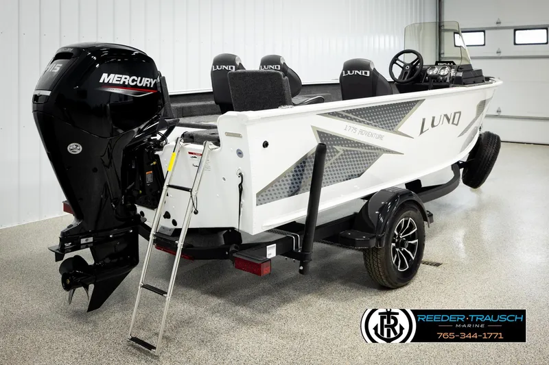 Slide: The Image of 2026 Lund 1775 Adventure SS boat with Mercury engine in showroom. - 4