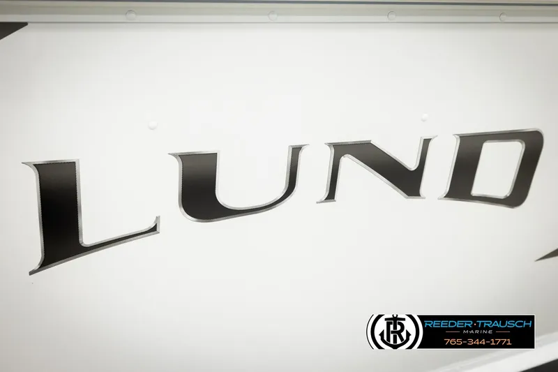 Slide: The Image of 2026 Lund 1775 Adventure SS boat logo with Reeder-Trausch Marine branding. - 48