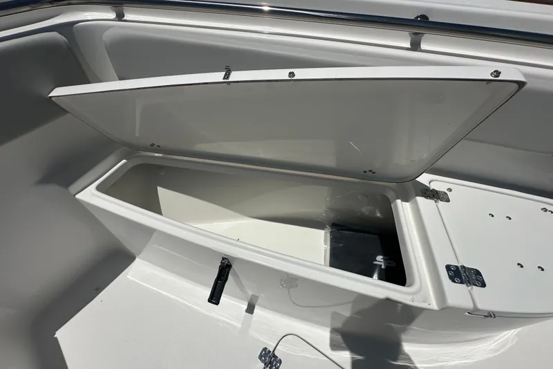 Slide: The Image of Open storage compartment on 2026 Sea Pro 222 Center Console boat. - 7
