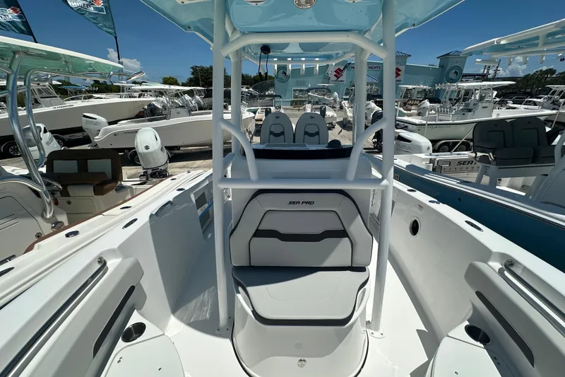 Slide: The Image of 2026 Sea Pro 222 Center Console boat interior at a marina display. - 8