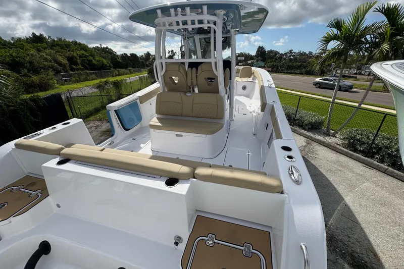 Slide: The Image of 2026 Sportsman Heritage 321 Center Console boat with sleek design and spacious seating. - 4