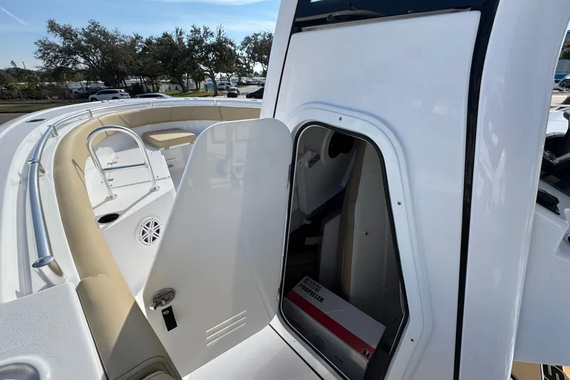 Slide: The Image of 2026 Sportsman Open 232 Center Console boat with open storage compartment. - 10