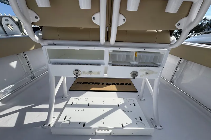 Slide: The Image of 2026 Sportsman Open 232 Center Console interior with storage compartments and seating. - 5