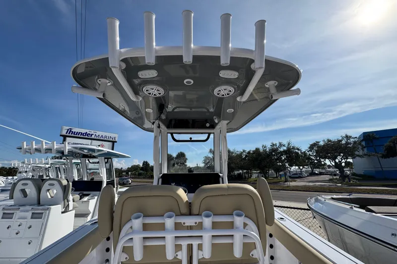 Slide: The Image of 2026 Sportsman Open 232 Center Console boat at Thunder Marine dealership. - 6