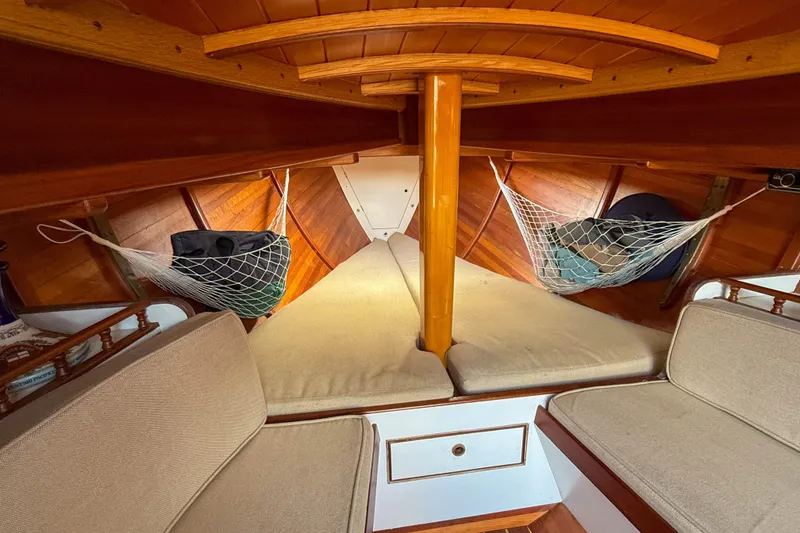 Slide: The Image of Interior of 2012 Herreshoff Custom Hyland Design "Rozinante" sailboat with cozy wooden finish. - 13