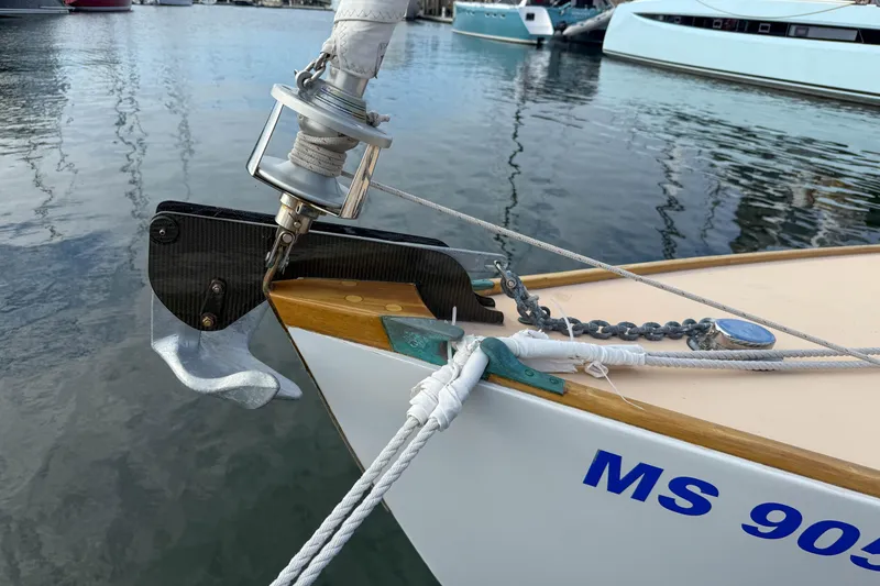 Slide: The Image of Bow of 2012 Herreshoff Custom Hyland Design "Rozinante" sailboat with anchor and ropes. - 21