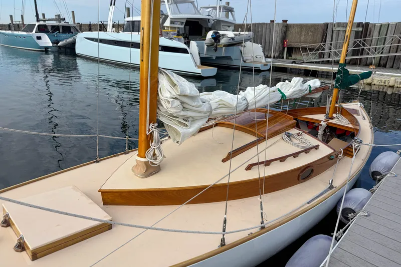 Slide: The Image of 2012 Herreshoff Custom Hyland Design "Rozinante" sailboat docked in marina. - 3