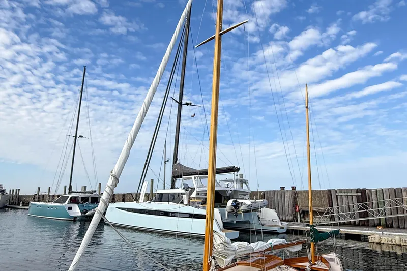 Slide: The Image of Sailboats docked at marina, featuring 2012 Herreshoff Custom Hyland Design "Rozinante". - 30