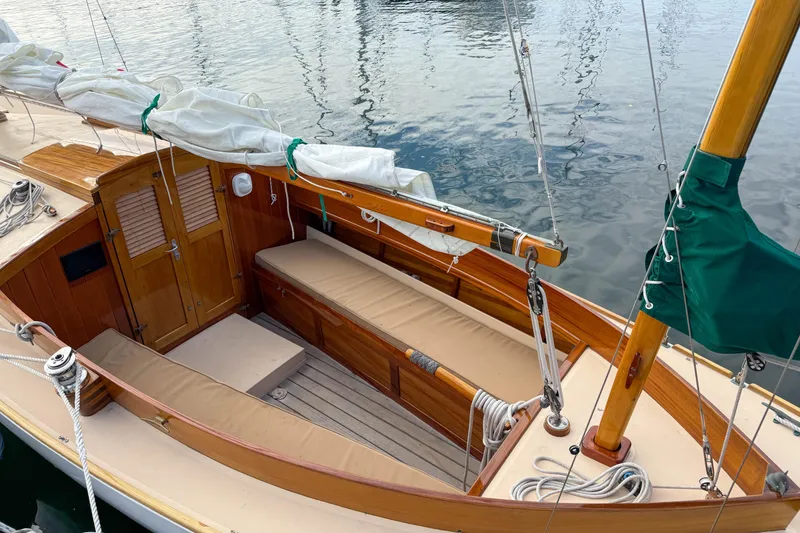 Slide: The Image of 2012 Herreshoff Custom Hyland Design "Rozinante" sailboat with wooden deck and seating. - 5