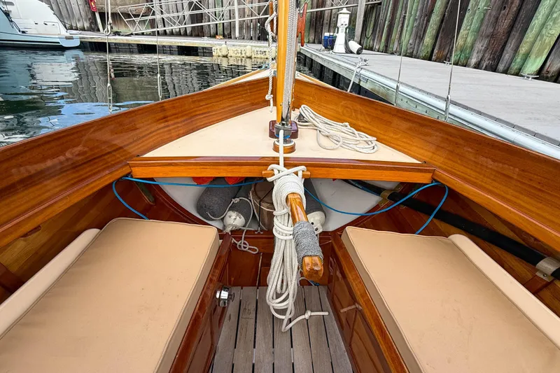 Slide: The Image of 2012 Herreshoff Custom Hyland Design "Rozinante" sailboat interior with wooden finish and seating. - 6
