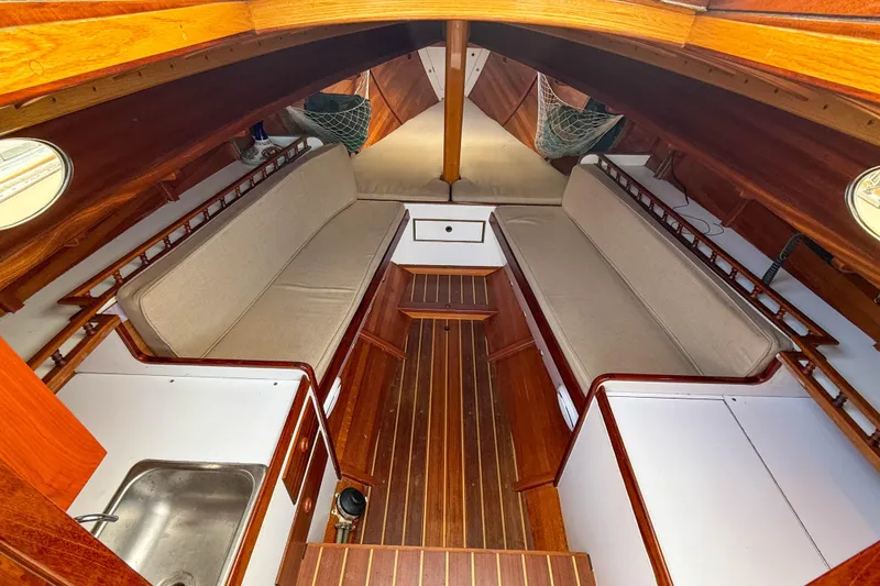 Slide: The Image of Interior of 2012 Herreshoff Custom Hyland Design "Rozinante" sailboat with wooden finish. - 9