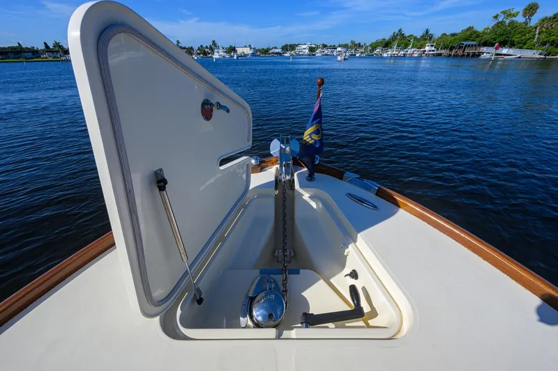 Slide: The Image of 2014 Hinckley Talaria 29C yacht anchor compartment with scenic water view. - 19