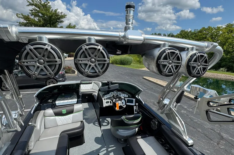 Slide: The Image of 2015 MasterCraft X30 boat interior with JL Audio speakers and sleek dashboard design. - 19