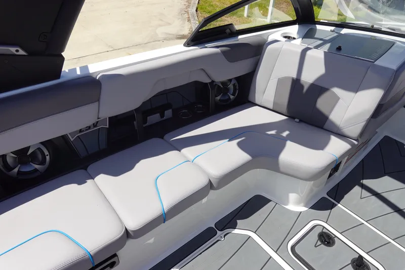 Slide: The Image of 2021 Malibu Wakesetter 25 LSV interior with sleek seating and modern design. - 15