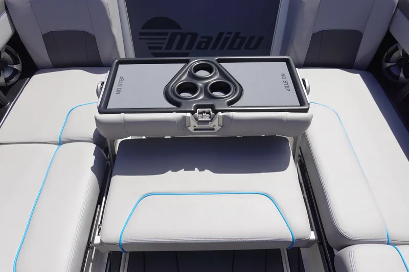 Slide: The Image of 2021 Malibu Wakesetter 25 LSV interior with cup holders and seating. - 24