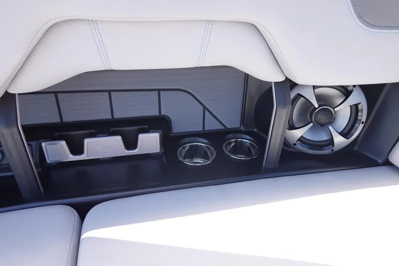 Slide: The Image of Interior of 2021 Malibu Wakesetter 25 LSV with speaker and cup holders. - 28