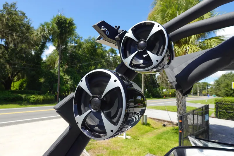 Slide: The Image of 2021 Malibu Wakesetter 25 LSV boat speakers, mounted on a sunny day. - 37