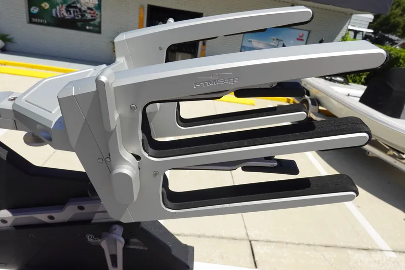 Slide: The Image of Close-up of 2021 Malibu Wakesetter 25 LSV boat rack in a sunny outdoor setting. - 39