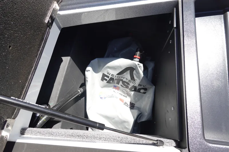 Slide: The Image of 2021 Malibu Wakesetter 25 LSV storage compartment with FATSAC ballast bag. - 40
