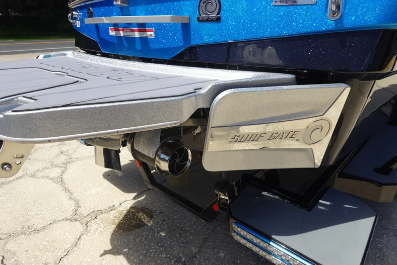 Slide: The Image of 2021 Malibu Wakesetter 25 LSV boat with Surf Gate technology, rear view. - 5
