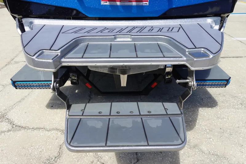 Slide: The Image of 2021 Malibu Wakesetter 25 LSV swim platform with sleek design and durable materials. - 7