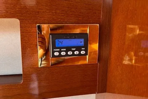 Slide: The Image of Digital thermostat on 2011 Sea Ray 280 Sundancer boat, set to 74 degrees. - 22