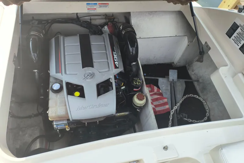 Slide: The Image of 2009 Sea Ray 280 Sundeck engine compartment with MerCruiser 496 engine. - 12
