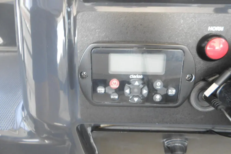 Slide: The Image of Control panel of a 2017 Formula 37 PC boat with Clarion audio system. - 22