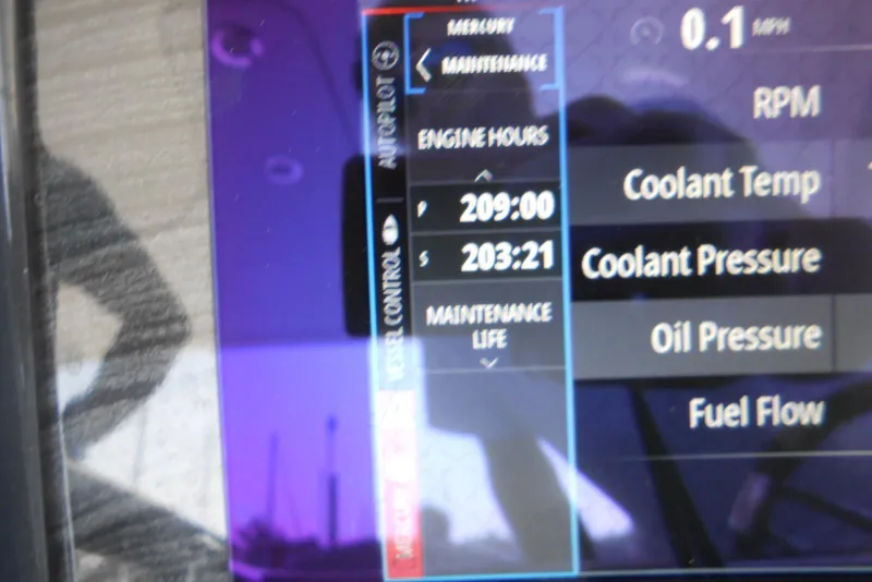 Slide: The Image of Dashboard display of a 2017 Formula 37 PC showing engine hours and maintenance data. - 27