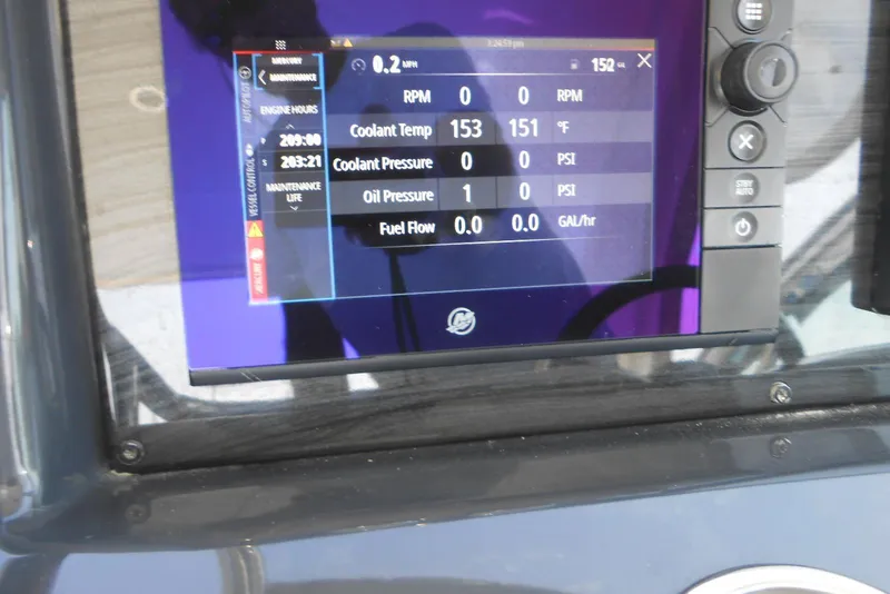 Slide: The Image of Dashboard display of a 2017 Formula 37 PC boat showing engine metrics. - 28