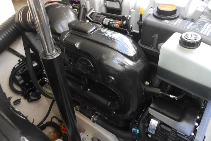 Slide: The Image of Engine compartment of a 2017 Formula 37 PC boat, showcasing mechanical components. - 32
