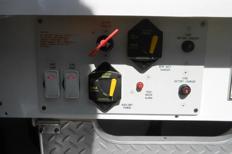 Slide: The Image of Control panel of a 2017 Formula 37 PC boat with switches and battery indicators. - 38