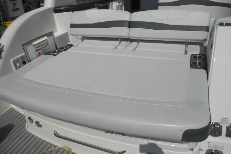 Slide: The Image of 2017 Formula 37 PC boat with spacious sunpad and integrated cup holders. - 41