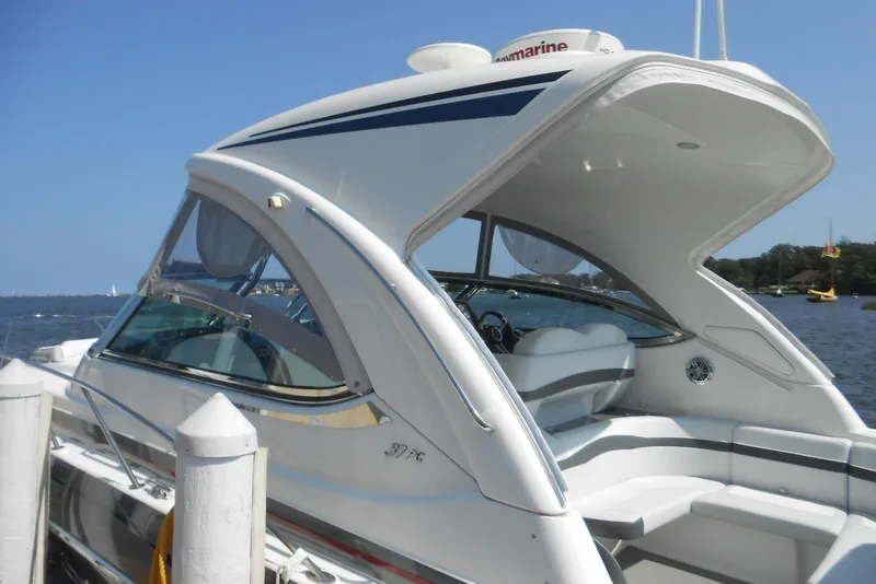 Slide: The Image of 2017 Formula 37 PC yacht docked by the water on a sunny day. - 7