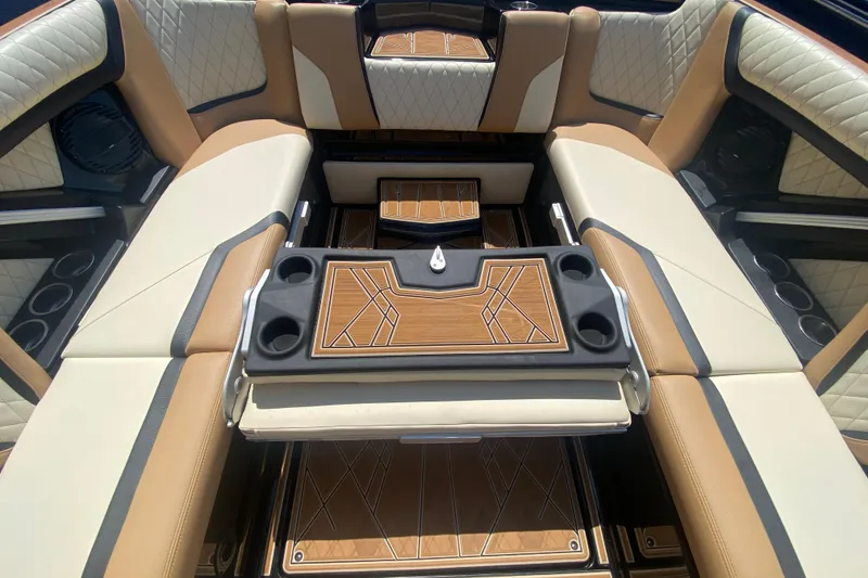 Slide: The Image of 2023 Tigé 23ZX boat interior with luxurious seating and stylish design. - 13