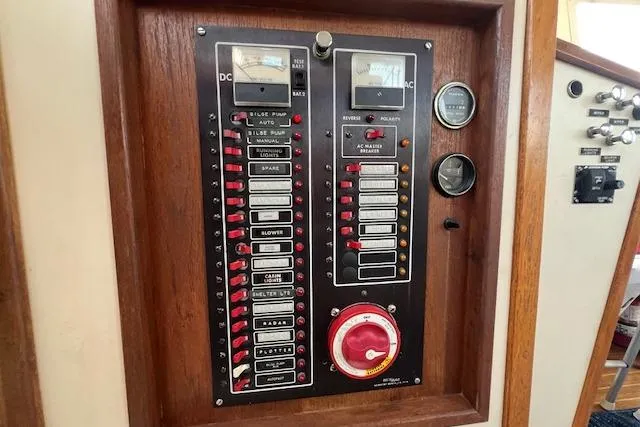 Slide: The Image of Control panel of a 1988 Ellis HARDTOP CRUISER with switches and gauges. - 21