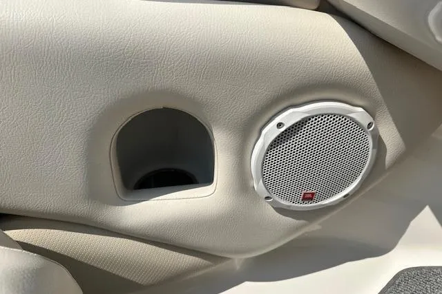 Slide: The Image of 2005 Chaparral 210 SSi boat interior with speaker and cup holder detail. - 25