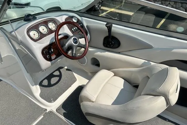 Slide: The Image of Interior of 2005 Chaparral 210 SSi boat with steering wheel and gauges. - 8
