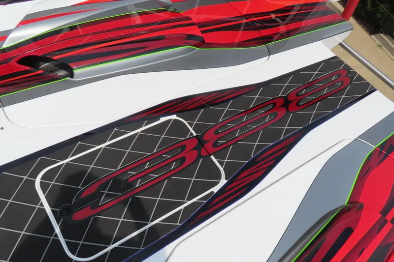 Slide: The Image of Colorful Skater 388 boat design, featuring bold red and black graphics, model year 2025. - 21