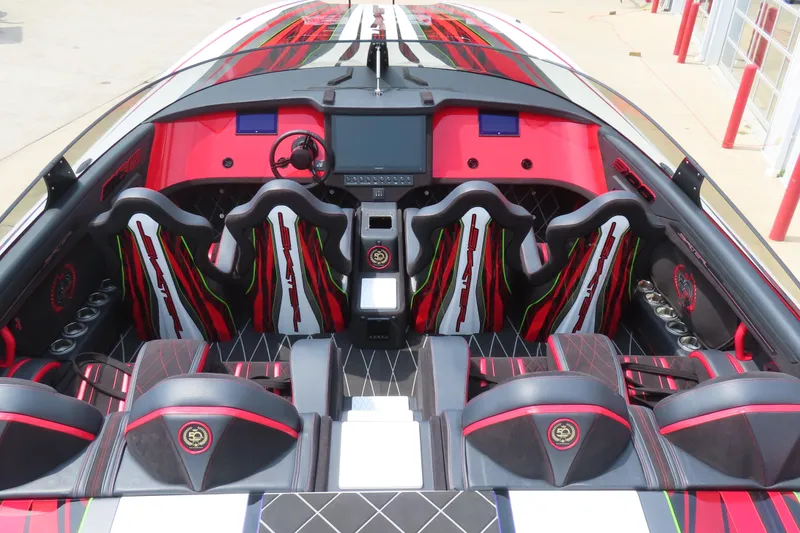 Slide: The Image of 2025 Skater 388 boat interior with sleek, modern design and vibrant red accents. - 22