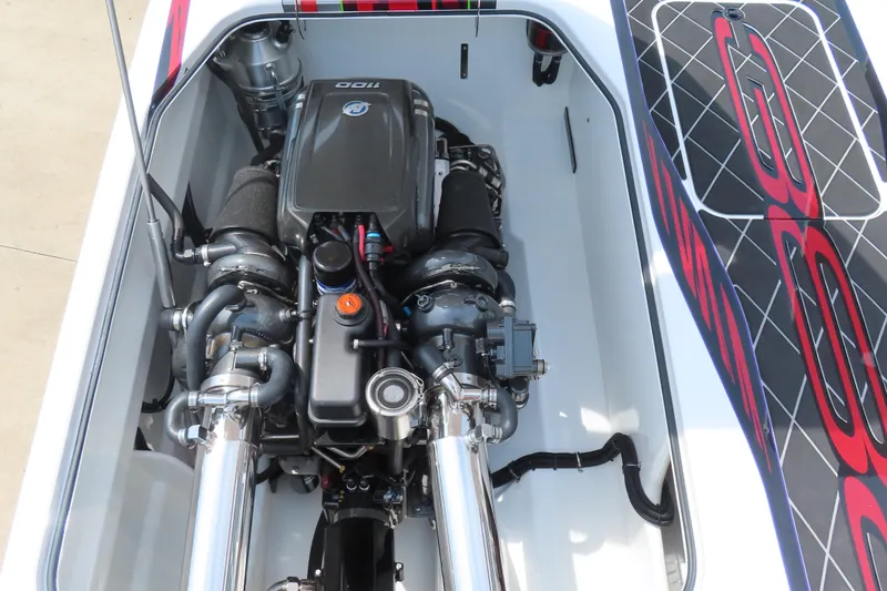 Slide: The Image of 2025 Skater 388 boat engine compartment with detailed components and sleek design. - 26