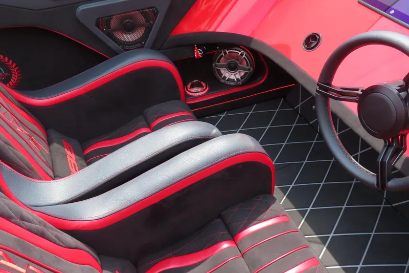 Slide: The Image of Futuristic Skater 388 interior, 2025 model, featuring sleek red and black design with advanced controls. - 28
