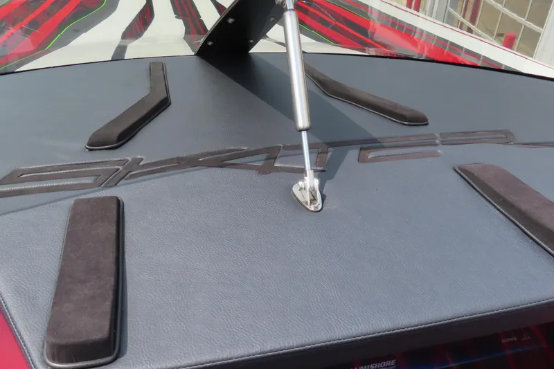 Slide: The Image of 2025 Skater 388 boat deck with logo and support strut. - 3