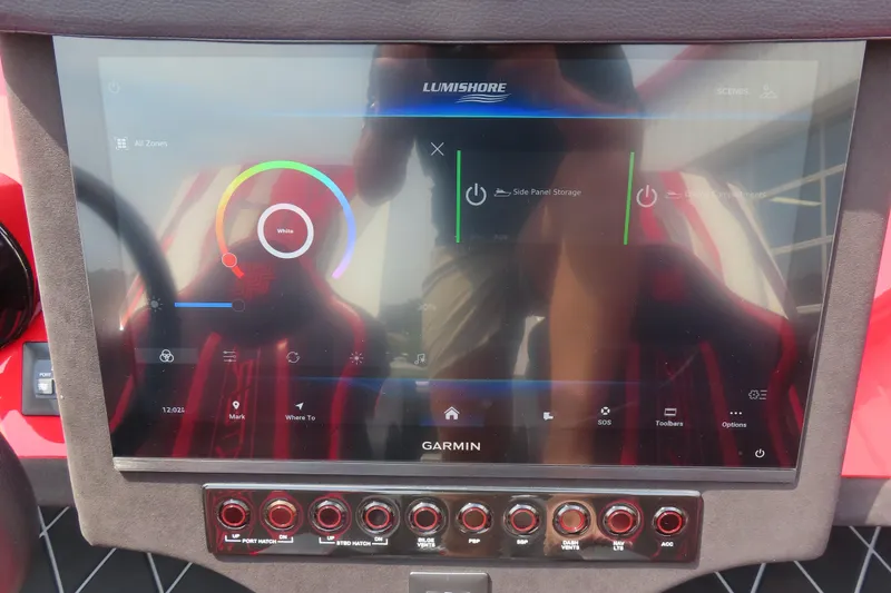 Slide: The Image of Garmin touchscreen interface on Skater 388, 2025 model, displaying Lumishore controls. - 30