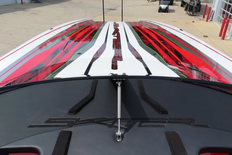 Slide: The Image of 2025 Skater 388 boat with vibrant red and white design on deck. - 4
