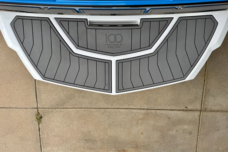 Slide: The Image of 2025 Nautique Super Air Nautique GS24 Centennial Edition swim platform, gray and white design. - 10