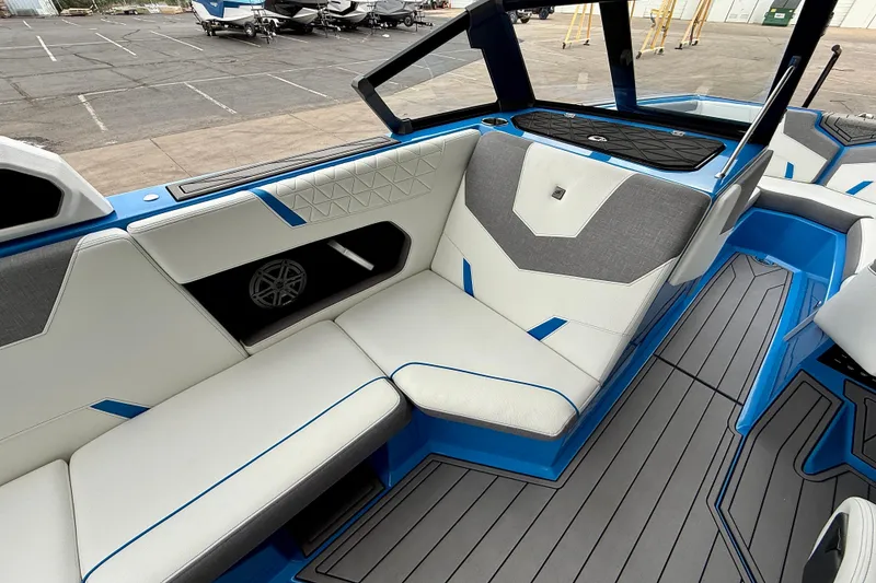 Slide: The Image of 2025 Nautique Super Air Nautique GS24 interior with modern seating and sleek design. - 14
