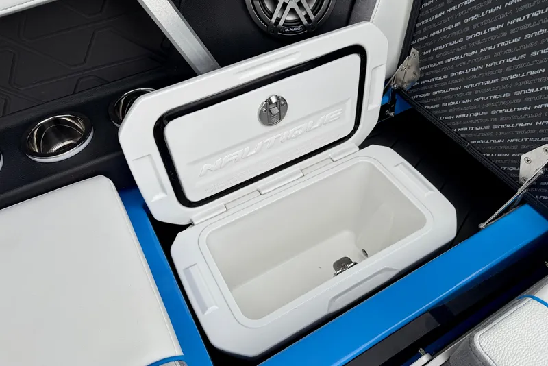 Slide: The Image of 2025 Nautique Super Air Nautique GS24 interior with open storage compartment. - 24