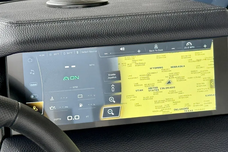 Slide: The Image of Dashboard display of 2025 Nautique Super Air Nautique GS24 with navigation and controls. - 37